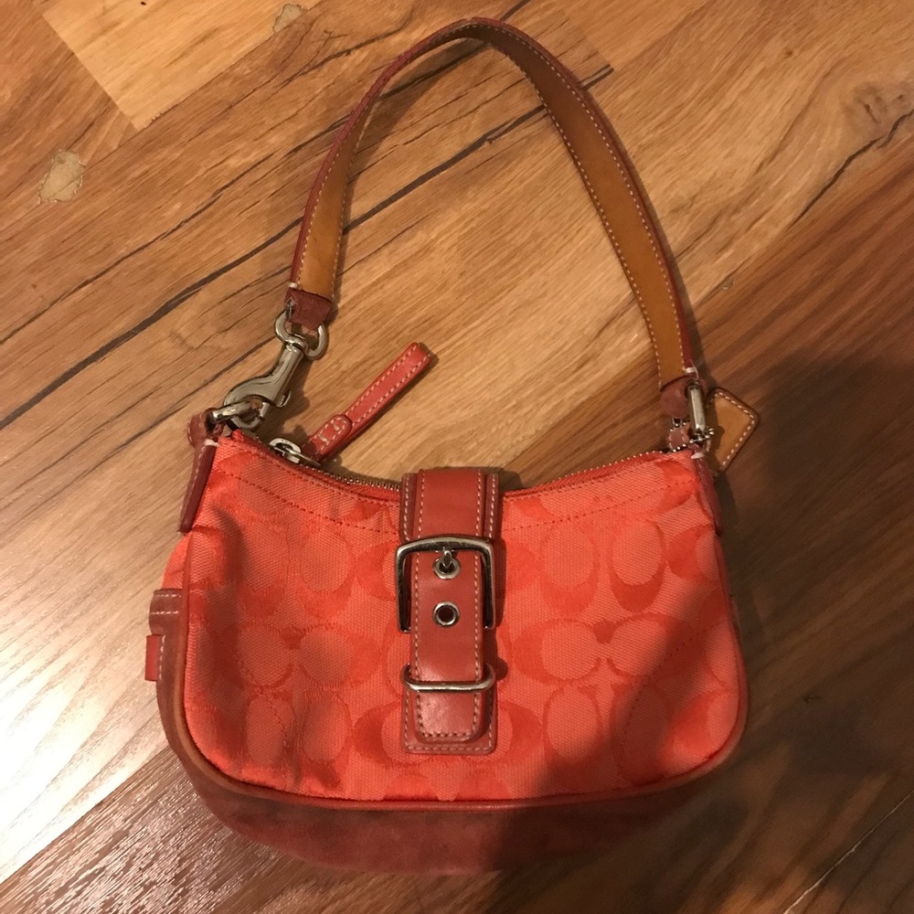 Coach orange pink monogrammed clutch bag